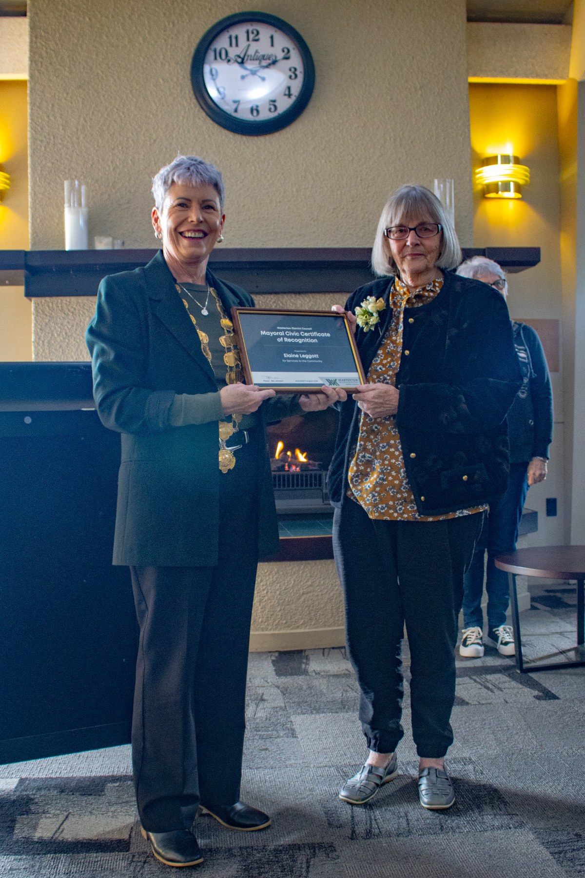 Mayor Bex Johnson standing with Elaine Leggott presenting a certificate